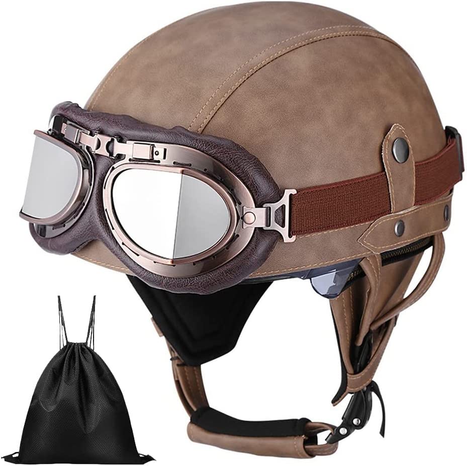 Le casque rétro en cuir noir avec sa forme classique et sa visière brune est l'accessoire idéal pour tout amoureux de la moto qui veut ajouter une touche vintage à son style. Sa texture en cuir offre un look élégant et authentique tandis que sa visière protège des rayons du soleil. Portez ce casque lors de votre prochaine virée à moto pour un style intemporel qui ne passera jamais de mode